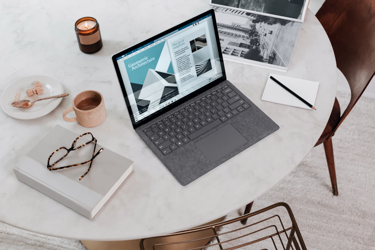 Home office desk with an external monitor connected to a laptop