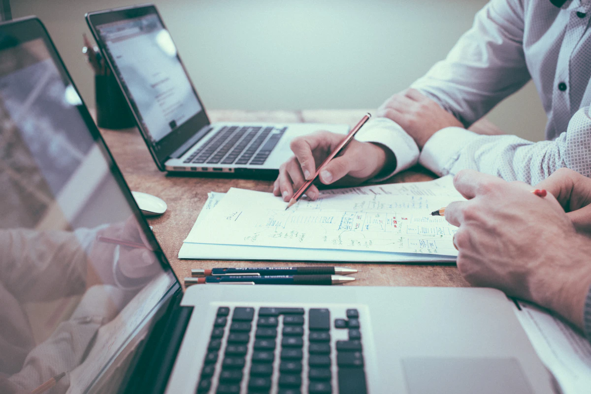Marketer writing customer research notes to build buyer personas