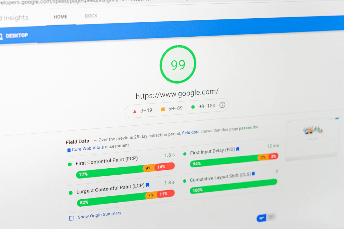 Laptop screen showing a website speed test score for a WordPress site