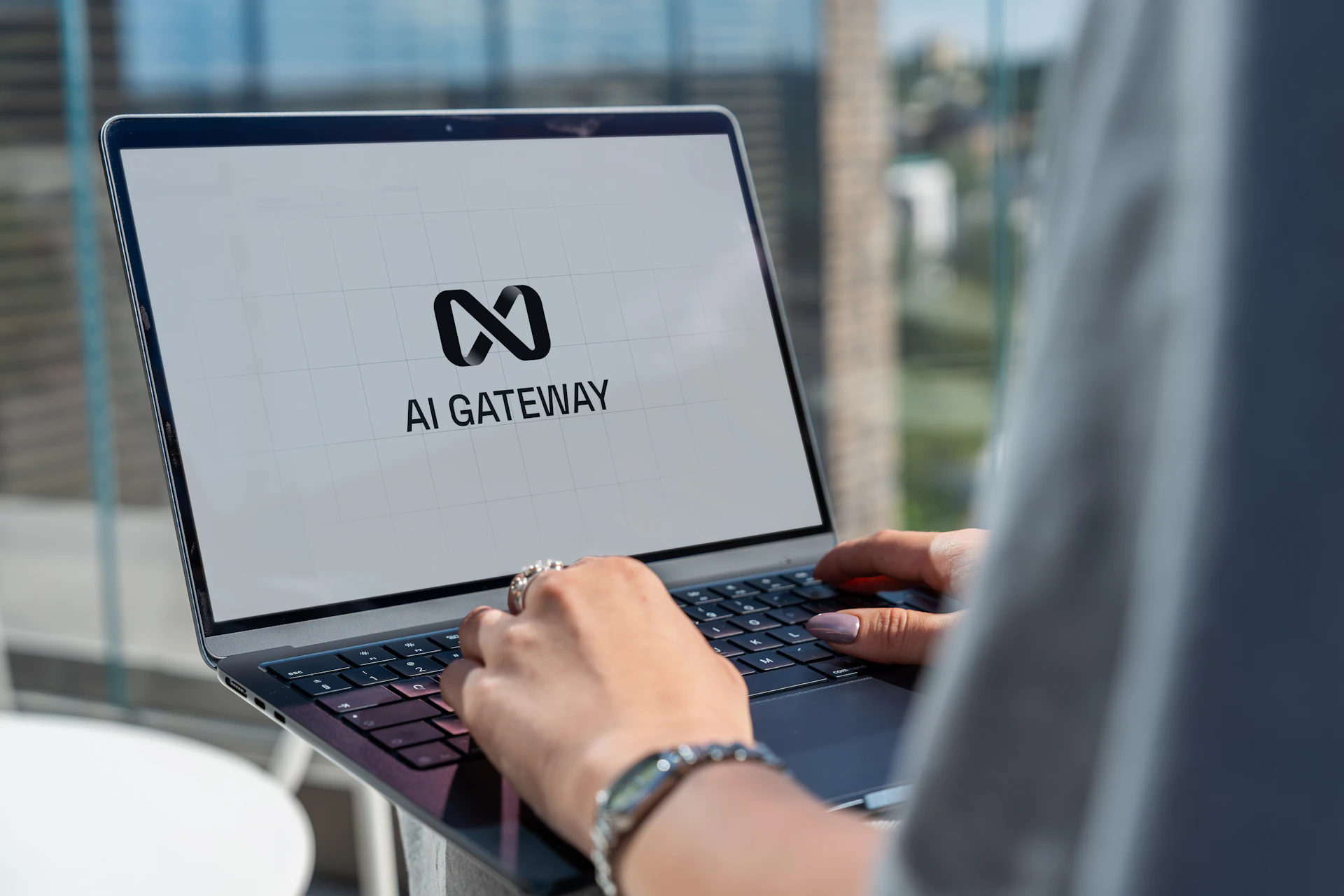 Marketer using ChatGPT on a laptop to plan a digital marketing campaign
