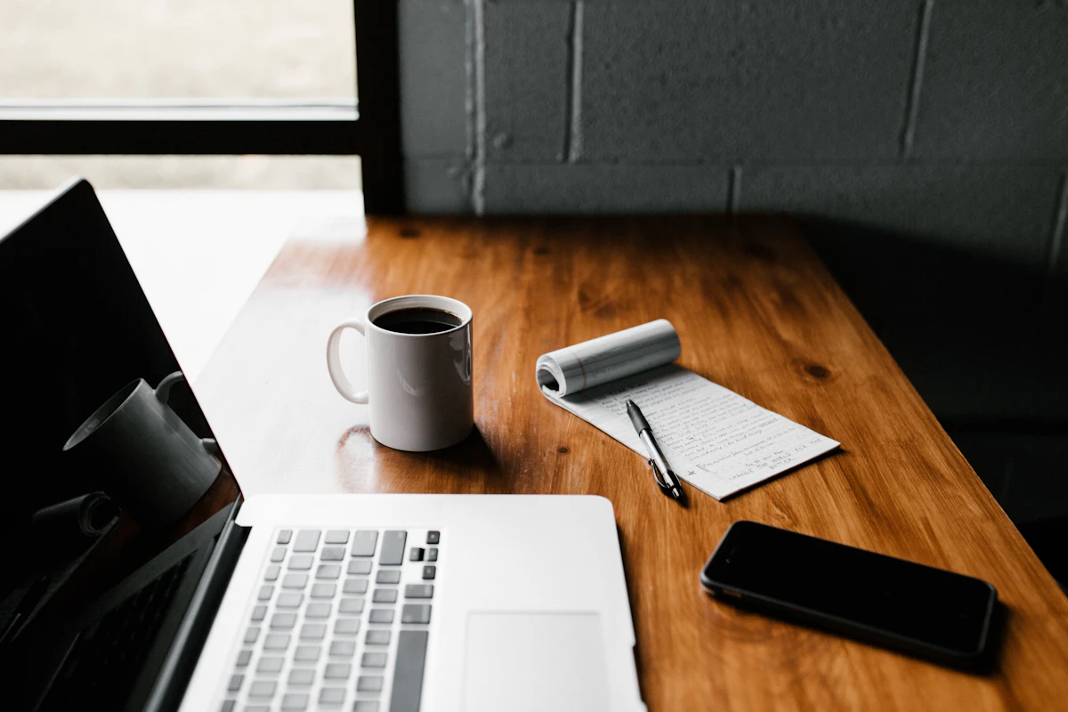 Marketer writing landing page copy on a laptop