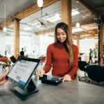 Small business owner checking local search results and Google Business Profile on a laptop