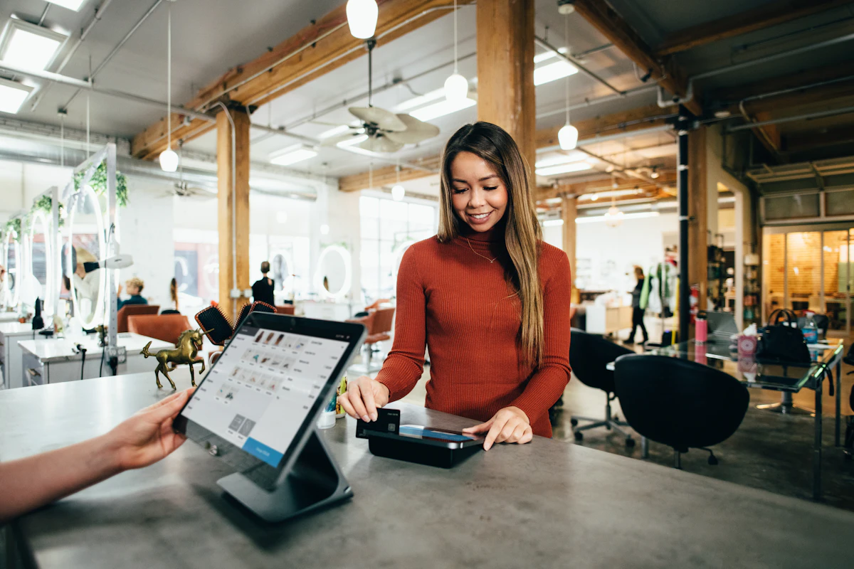 Small business owner checking local search results and Google Business Profile on a laptop