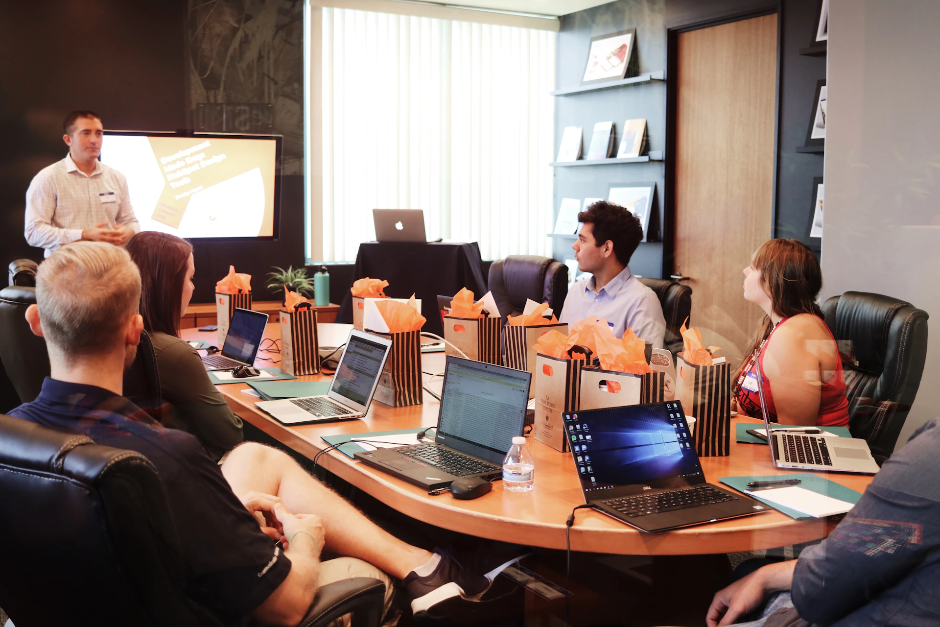 Digital marketing team planning an AI-assisted content strategy in a meeting